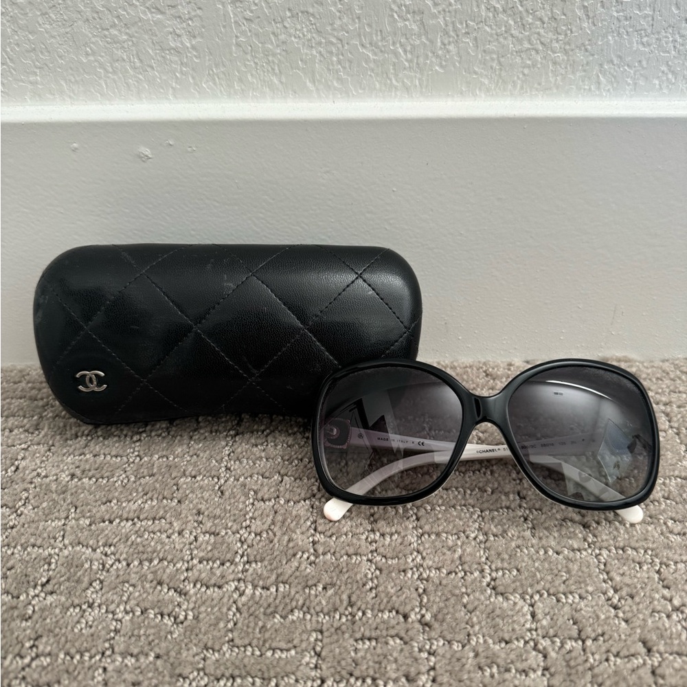 Re-poshed!
CHANEL Black Sunglasses with White Accents